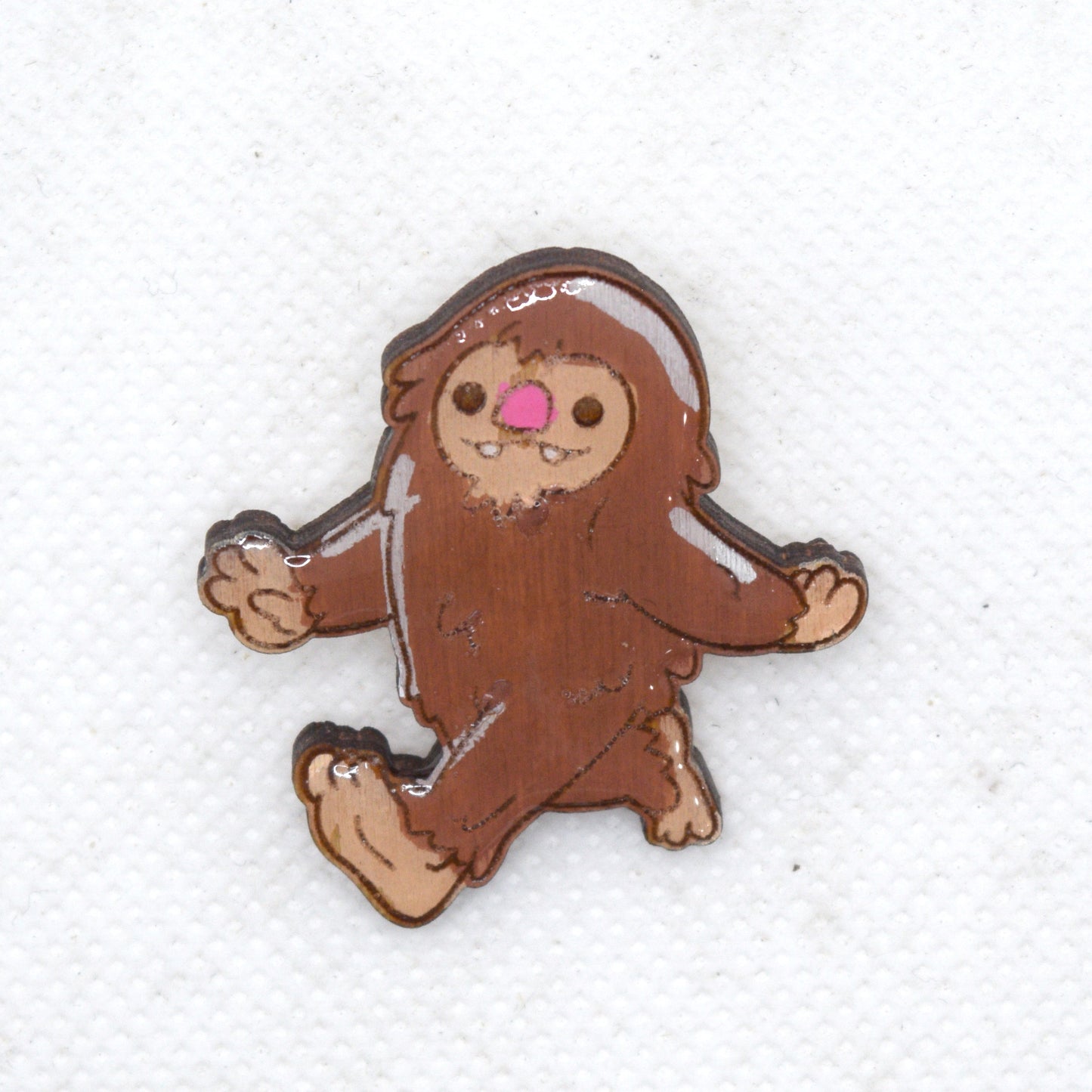 Cutesy Bigfoot Wooden Lapel Pin front