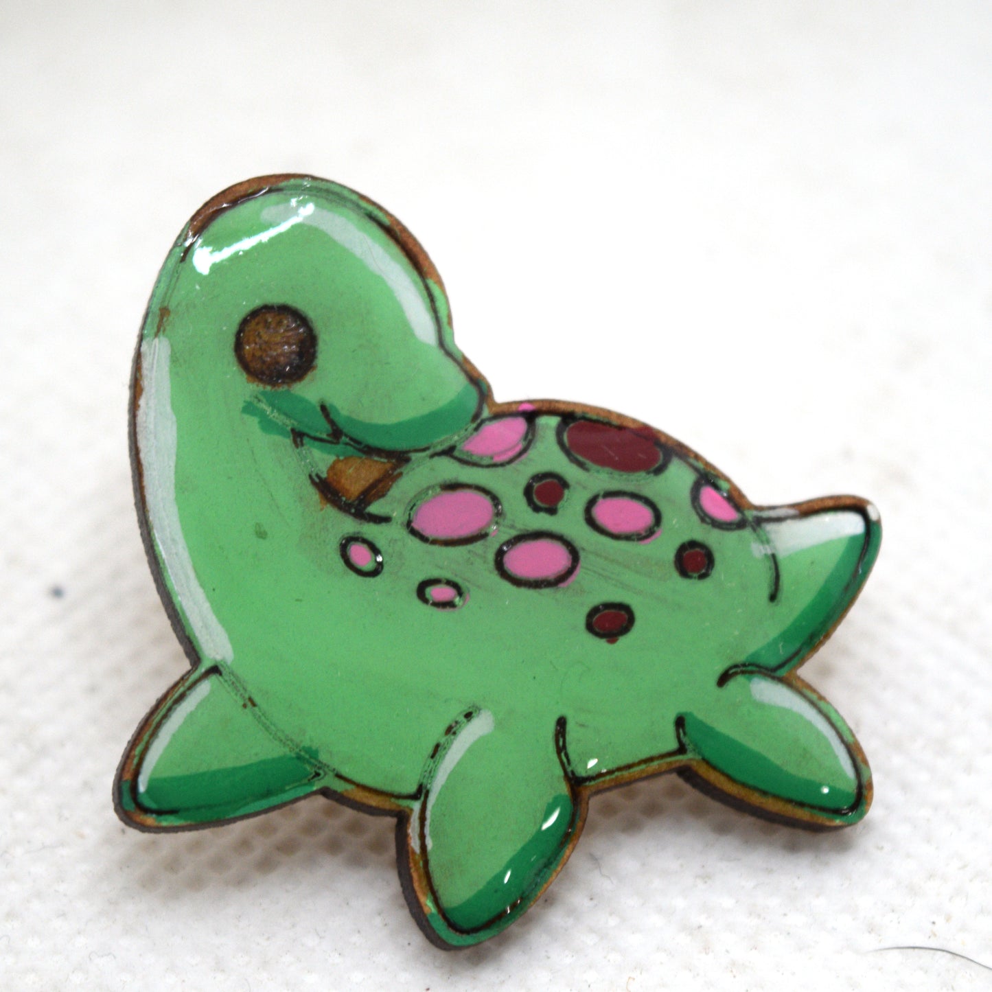 Cutesy Nessy Wooden Lapel Pin Front