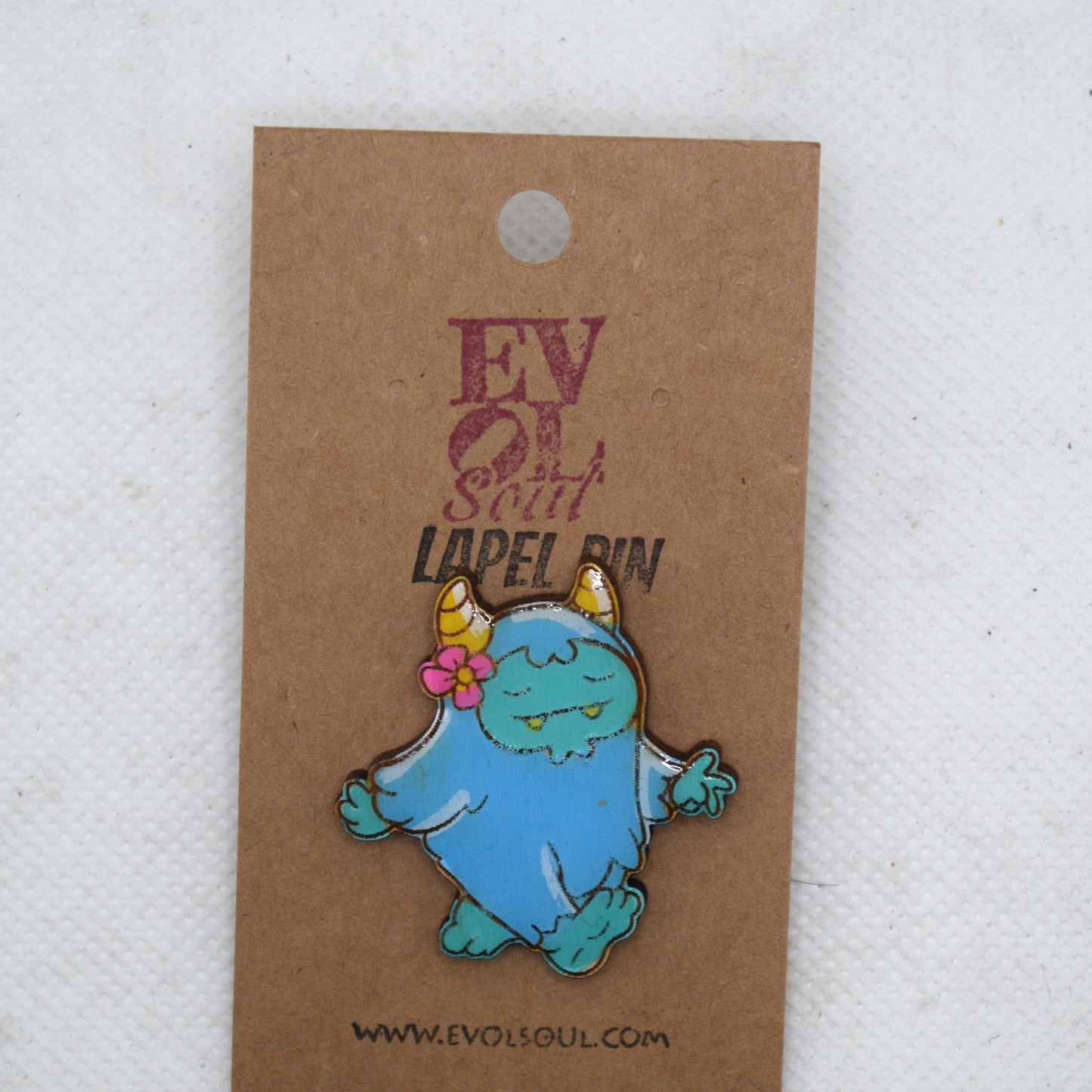 Cutesy Yeti Wooden Lapel Pin on Evol Soul Card