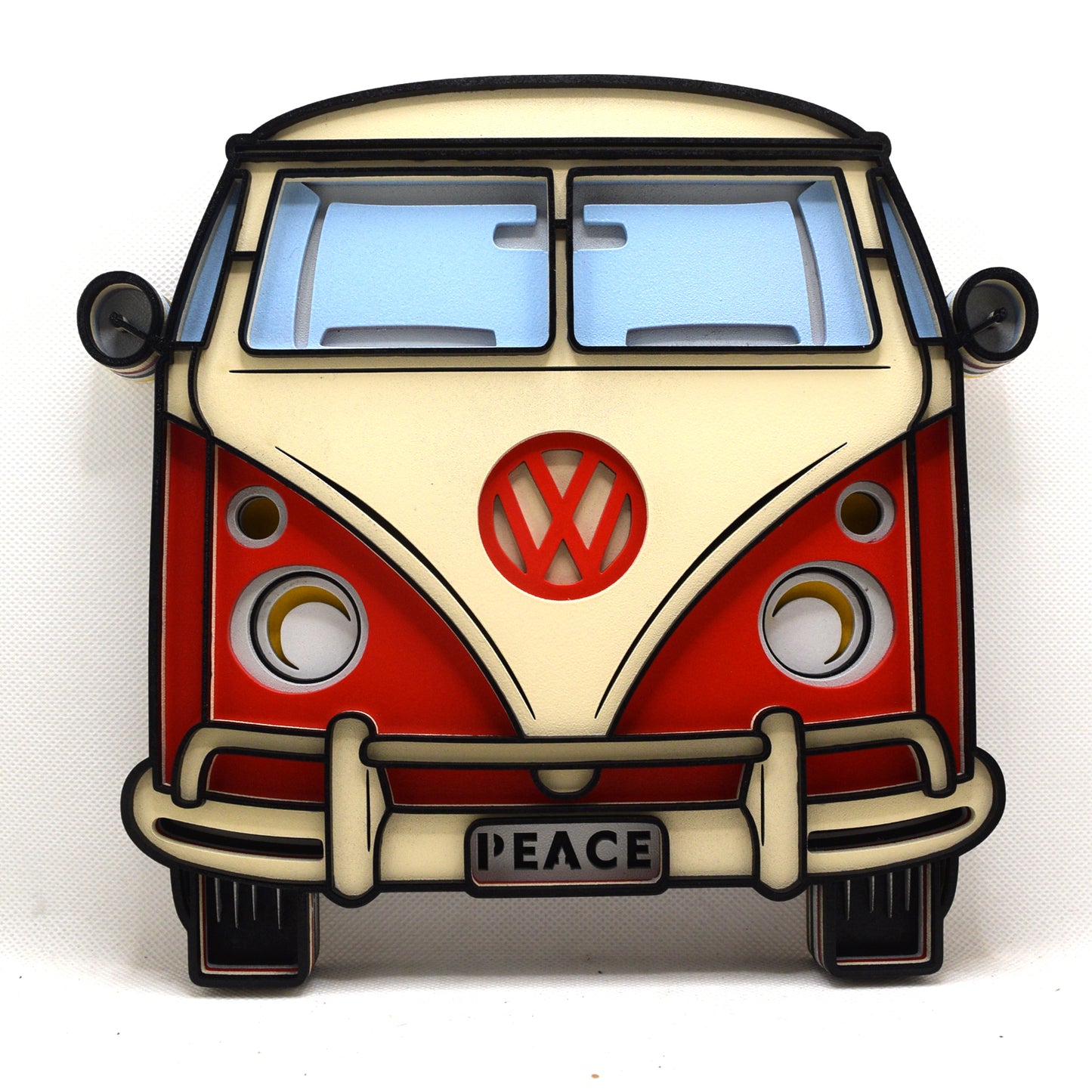 Red and beige Volkswagen van with 'PEACE' sign on a white background