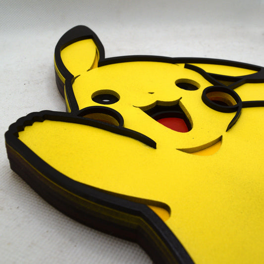 Yellow and black Pikachu-shaped object on a white background