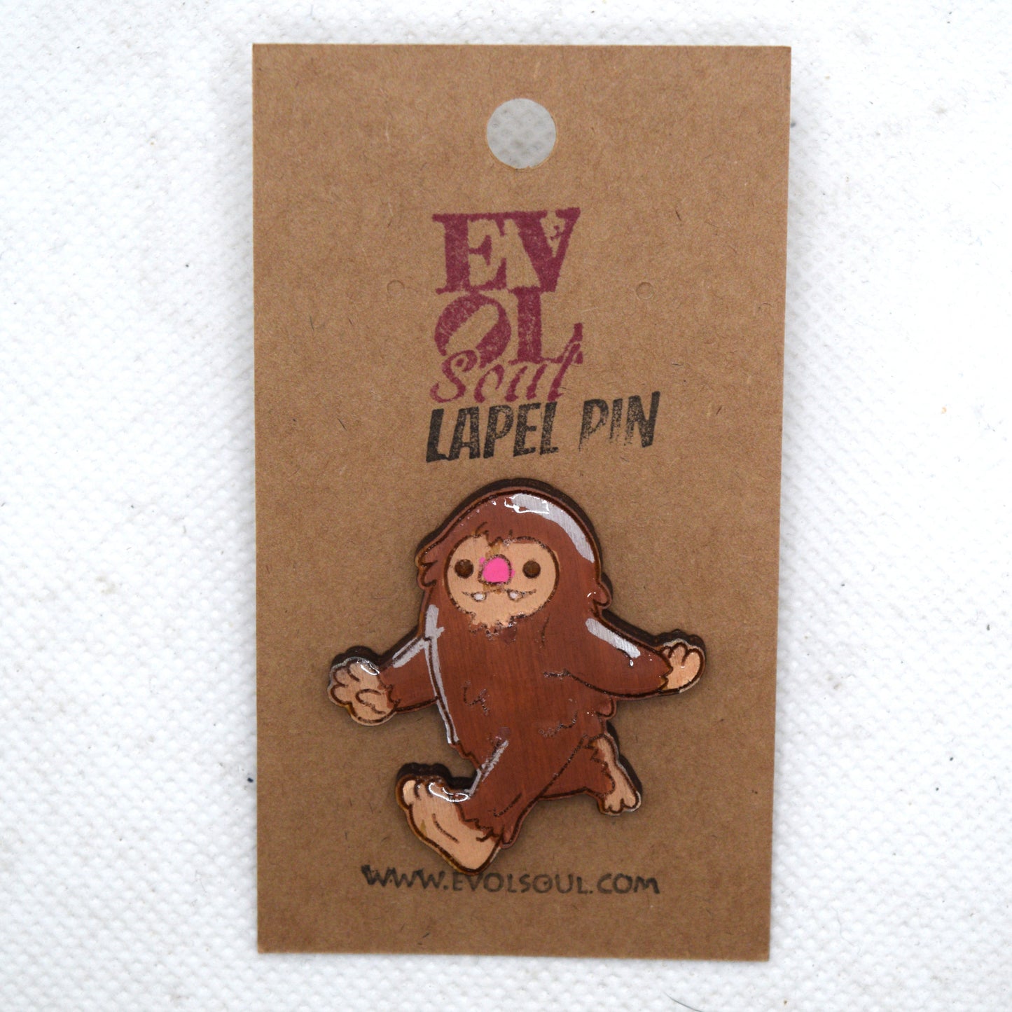 Cutesy Bigfoot Wooden Lapel Pin on Evol Soul Card