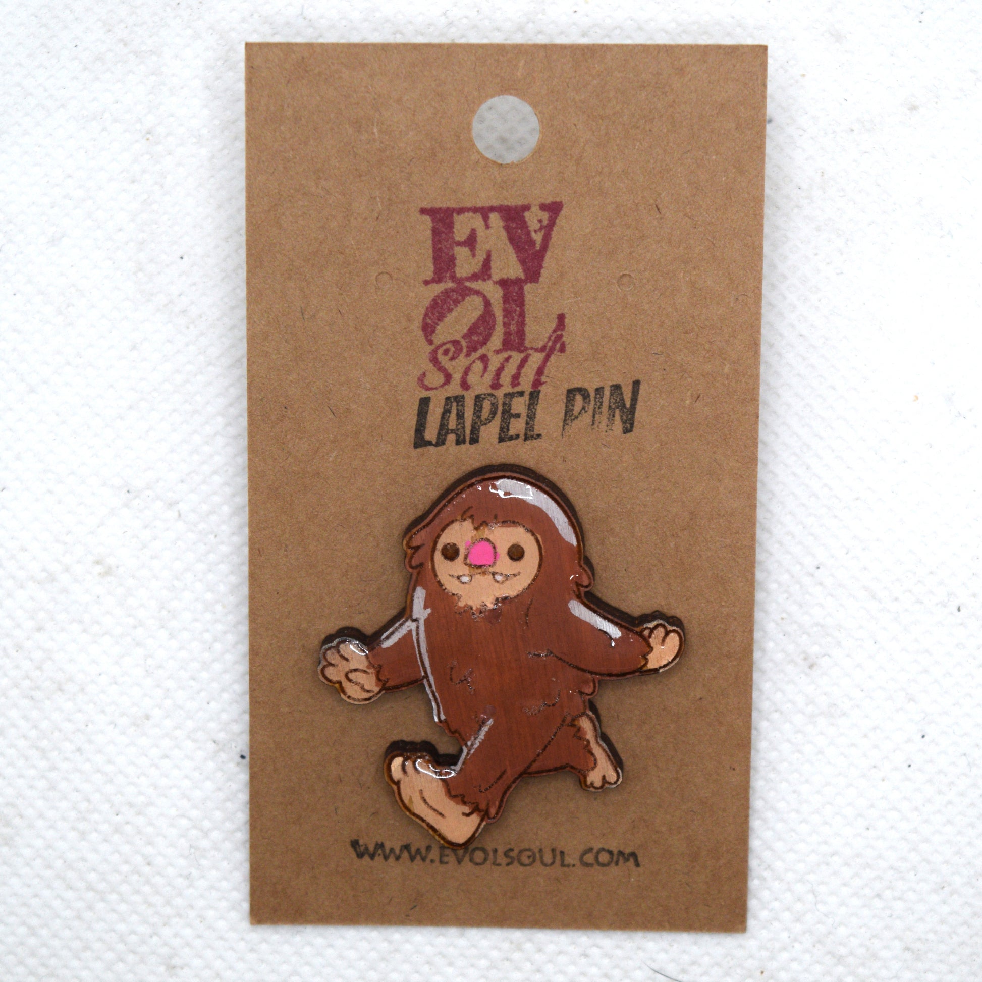 Cutesy Bigfoot Wooden Lapel Pin on Evol Soul Card