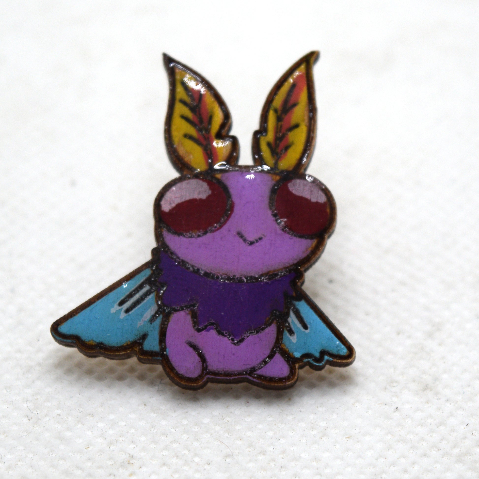 Cutesy Mothman Sitting Wooden Lapel Pin