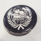 Button badge with 'Fight Like Girl' design and laurel wreath on a white background