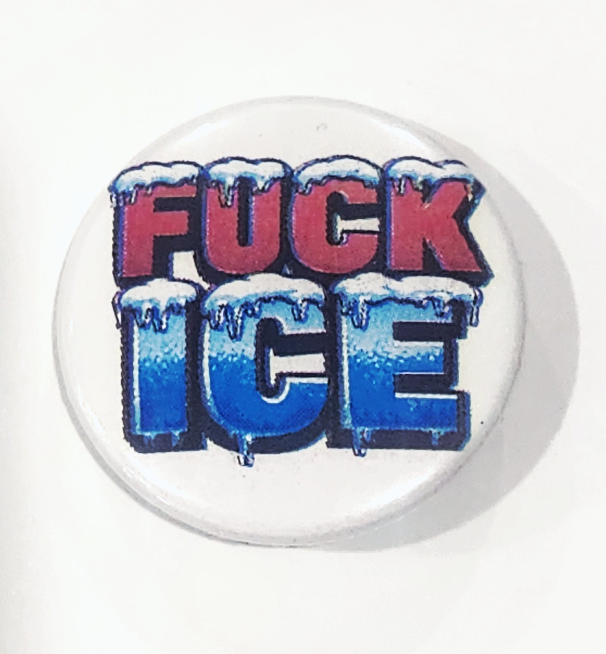 Button badge with 'FUCK ICE' text on a white background