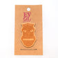 Tiki God 1 Wooden Lapel Pin on Evol Soul Branded Card