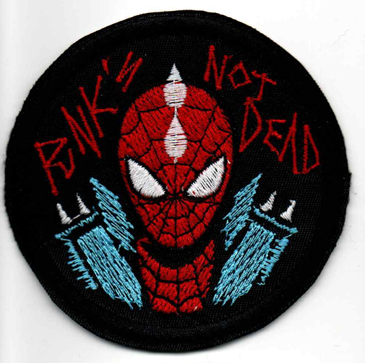 Spider-Man patch with 'Punks is Not Dead' text on a black background