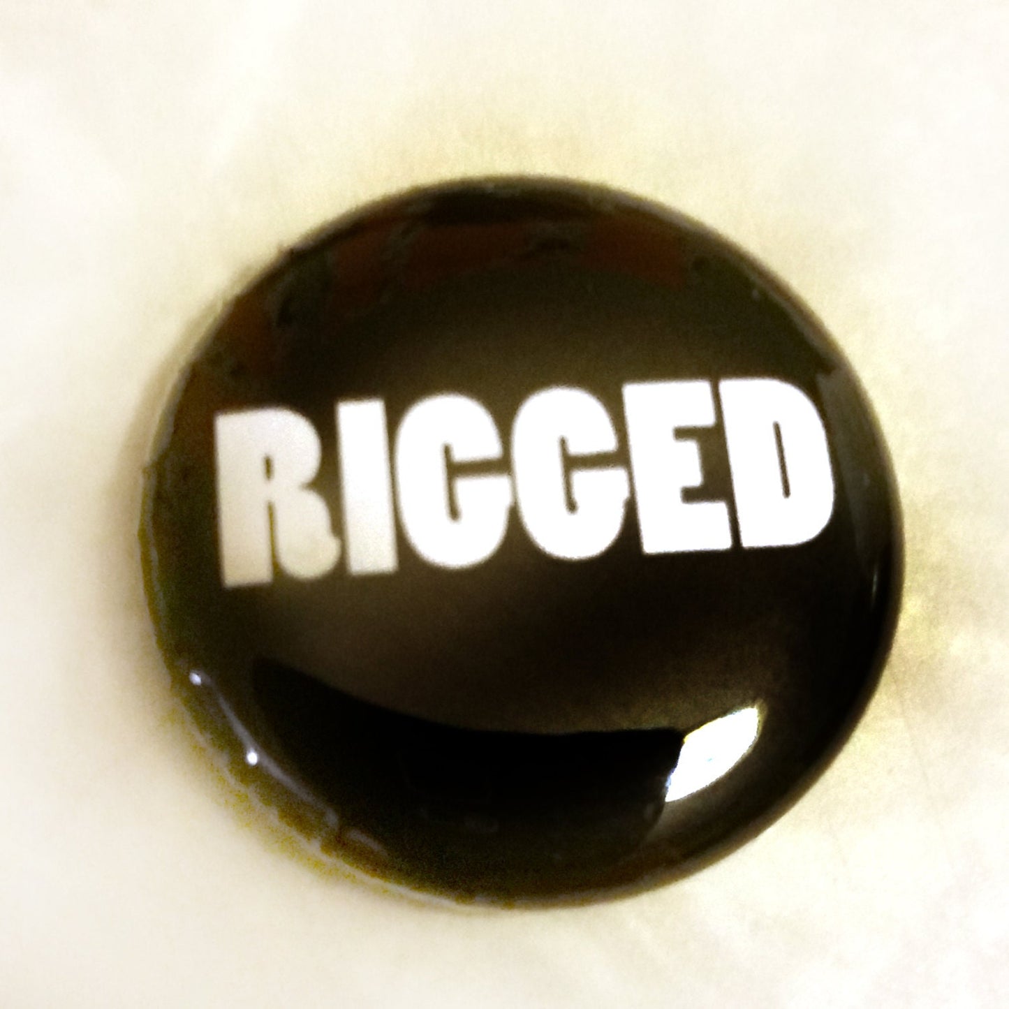 RIGGED 1 inch Button